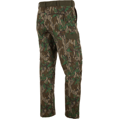 Ol' Tom Tech Stretch Turkey Pants with camouflage design, featuring cargo pockets and articulated knees, ideal for hunting flexibility and comfort.