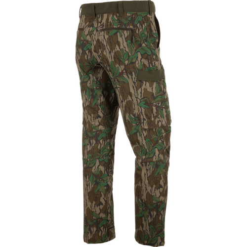 Ol' Tom Tech Stretch Turkey Pants with camouflage design, featuring cargo pockets and articulated knees, ideal for hunting flexibility and comfort.