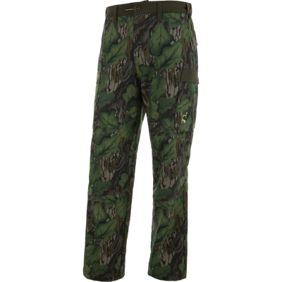 Ol' Tom Tech Stretch Turkey Pants with woodland-camouflage, multiple cargo pockets, and articulated knees for flexible, comfortable hunting wear.