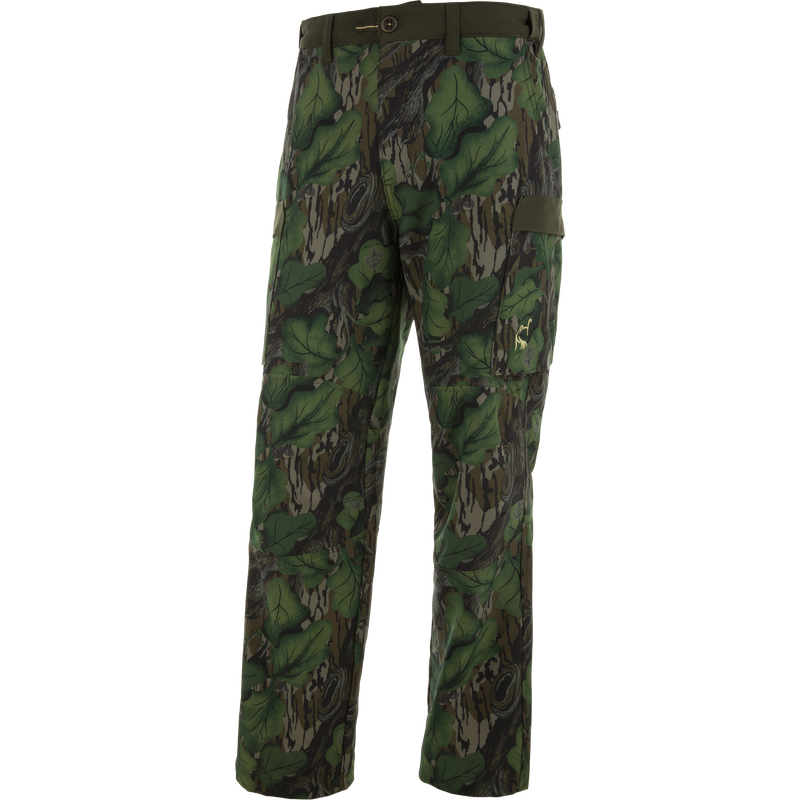 Ol' Tom Tech Stretch Turkey Pants with woodland-camouflage, multiple cargo pockets, and articulated knees for flexible, comfortable hunting wear.