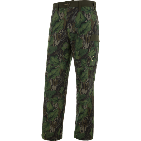 Ol' Tom Tech Stretch Turkey Pants with woodland-camouflage, multiple cargo pockets, and articulated knees for flexible, comfortable hunting wear.