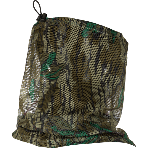 Performance Mesh Half Mask on glossy mannequin head, showcasing camo-patterned mesh with bungee adjustment for secure, breathable fit, ideal for hunting and outdoor protection.