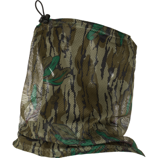 Performance Mesh Half Mask on glossy mannequin head, showcasing camo-patterned mesh with bungee adjustment for secure, breathable fit, ideal for hunting and outdoor protection.