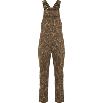 Turkey Bib with Spider Web Technology features brown overalls with straps, offering stretch material, water-resistant seat, and cargo pockets for hunting and outdoor activities.