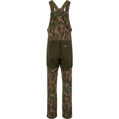 Turkey Bib with Spider Web Technology, featuring camouflage overalls and pants with cargo pockets, designed for high-performance hunting with breathability and water resistance.
