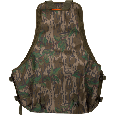Youth Time and Motion Turkey Vest with camouflage pattern, straps, and quick-draw pouches, offering durability and comfort for hunting with neoprene shoulder straps and safety flag.