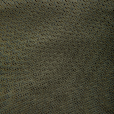 Close-up of olive-green perforated mesh fabric on the Turkey Strap Vest, designed for optimal gear placement and functionality during turkey hunting.