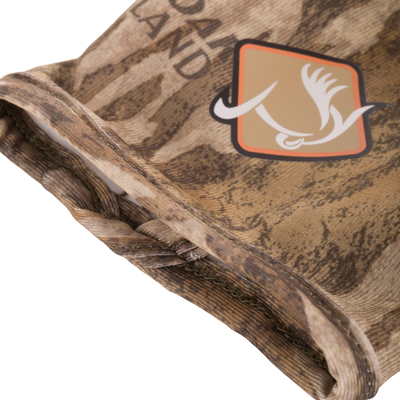 Performance Stretch-Fit Shooter Turkey Gloves showcasing close-up of the silicone grip texture on camouflage fabric, highlighting superior grip for outdoor activities.