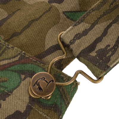 Throwback 80 Field Bib featuring durable cotton twill, antique brass buttons, and triple needle stitching, designed for resilience and practicality in hunting and outdoor tasks.