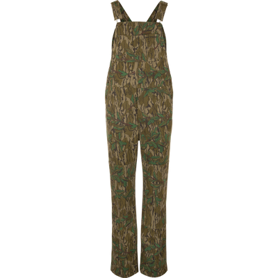 Throwback 80 Field Bib in camouflage, featuring sturdy cotton twill, reinforced knees, and antique brass details, designed for durability in demanding environments.