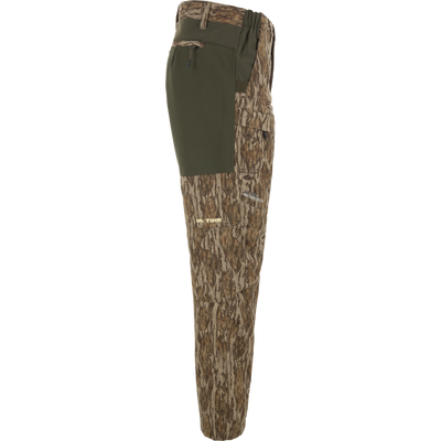 Ol' Tom Early Bird SWT Pant in camo, featuring Vital Protection insect-repellent, stretch panels, and zippered pocket for comfortable, quiet, bug-free hunting.