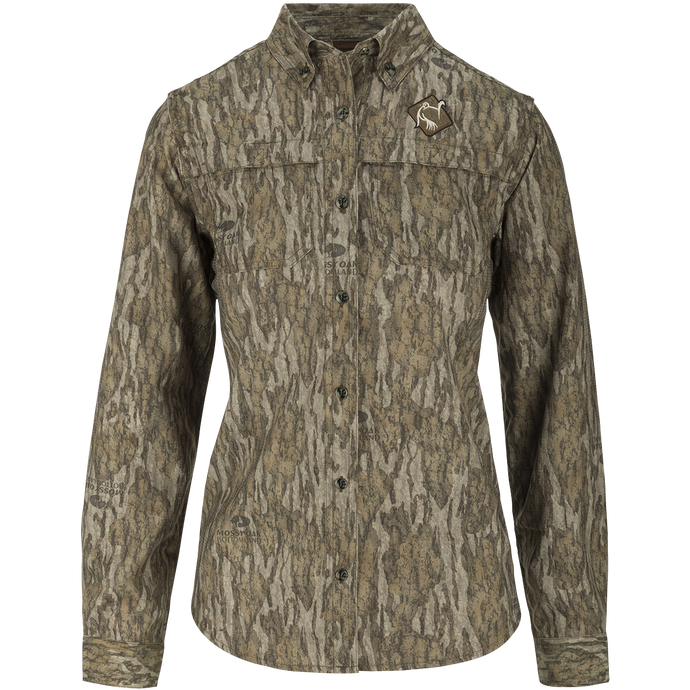 A technical Ol’ Tom Women's Mesh Back Flyweight Shirt 2.0 with reduced spine pad for hunting comfort. Lightweight, breathable, and quick-drying polyester construction. Ideal for big game and waterfowl hunting.
