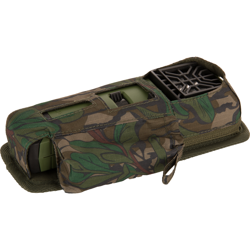 Thermacell Pouch 2.0 with Molle Attachment holds a compact sensor unit with green electronics housing and black antenna module, featuring a woodland camo design.