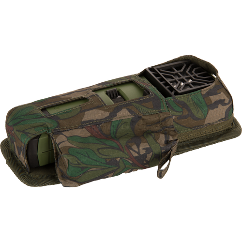 Thermacell Pouch 2.0 with Molle Attachment holds a compact sensor unit with green electronics housing and black antenna module, featuring a woodland camo design.