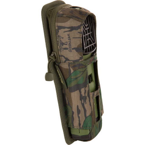 Thermacell Pouch 2.0 with Molle Attachment, featuring a camouflage design, holds a green handheld device with a vented top and visible battery pack.