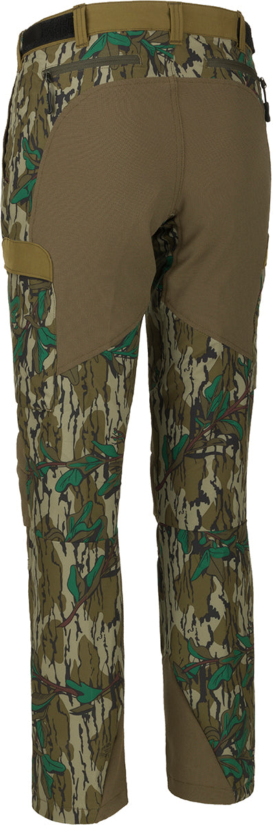 A pair of Women's Tech Stretch Turkey Pants, designed for spring turkey hunting. Lightweight, moisture-wicking, and durable with reinforced knees and ankles. Relaxed fit with adjustable waistband and mesh pockets for ventilation.