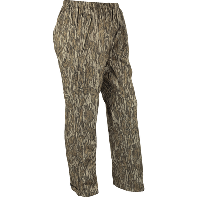 Ultralight Packable Rain Pant, camouflage design, shown in full view, highlighting its waterproof/windproof fabric, ideal for turkey hunting. Comes with a compact elastic closure bag.