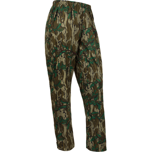 A pair of Ultralight Packable Rain Pants with a leaf pattern, perfect for spring showers during turkey season. Waterproof, windproof, and breathable, these pants are made with Performance LITE 3-Layer Stretch fabric. Easily packable in a 7