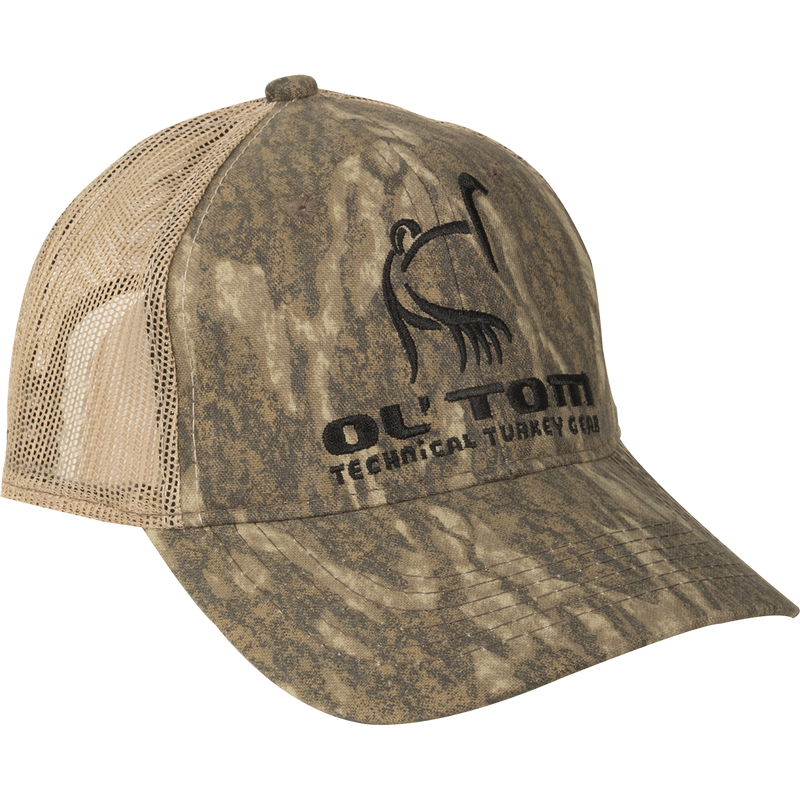 Camo Mesh Back Ol' Tom Logo Cap with a turkey-head logo, mesh back, and Velcro adjustment, ideal for hunting enthusiasts seeking functional, stylish headgear.
