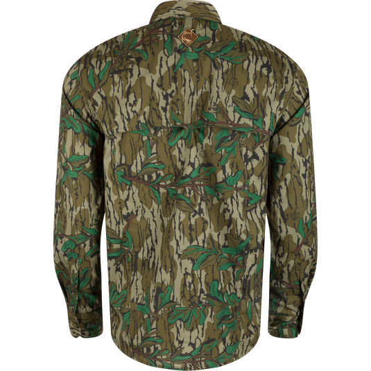 Backside of Men's Camo Wingshooter Trey Shirt L/S with UPF30, moisture-wicking fabric, hidden pockets, and vented back for hunting comfort. From Drake Waterfowl.