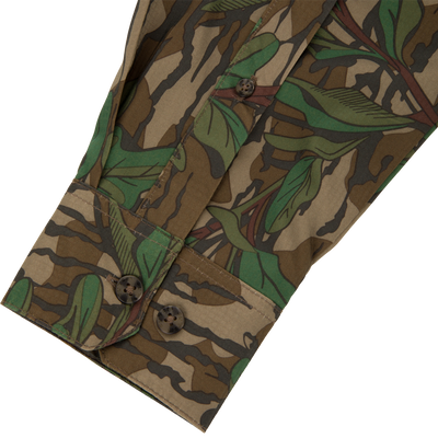 Men's Camo Wingshooter Trey Shirt close-up, highlighting detailed button design and fabric texture, emphasizing technical features like hidden button collar and vented back for performance.