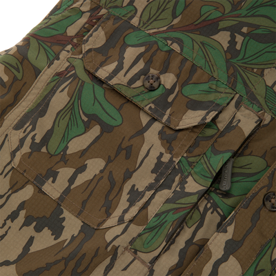 Men's Camo Wingshooter Trey Shirt, featuring camouflage pattern, close-up of button, pockets, and vented back, highlighting technical features and classic design.