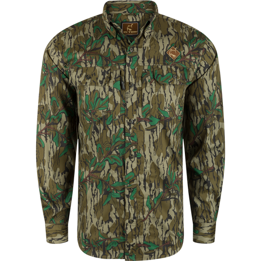 Men's Camo Wingshooter Trey Shirt L/S: Old School Green camo shirt with logo, hidden collar, chest pockets, vented back, and technical features for hunting and outdoor activities.