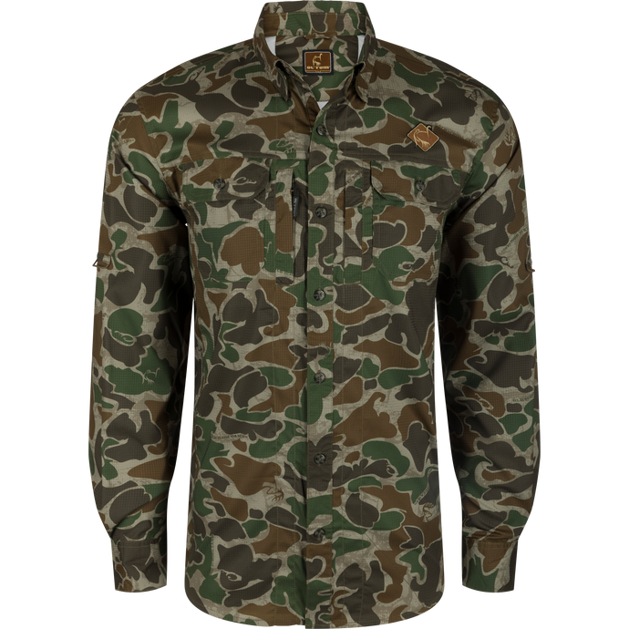 Men's Camo Wingshooter Trey Shirt L/S in Old School Green Camo with hidden pockets, vented back, and adjustable sleeves for hunting and outdoor activities.
