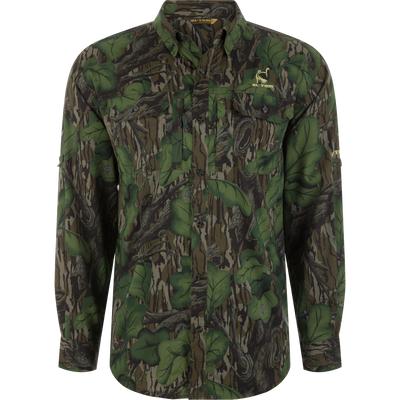 Ol' Tom Men's Camo Wingshooter Trey Shirt, featuring a full-foliage camouflage pattern, two chest pockets, fold-down collar, and vented back for optimal hunting performance.