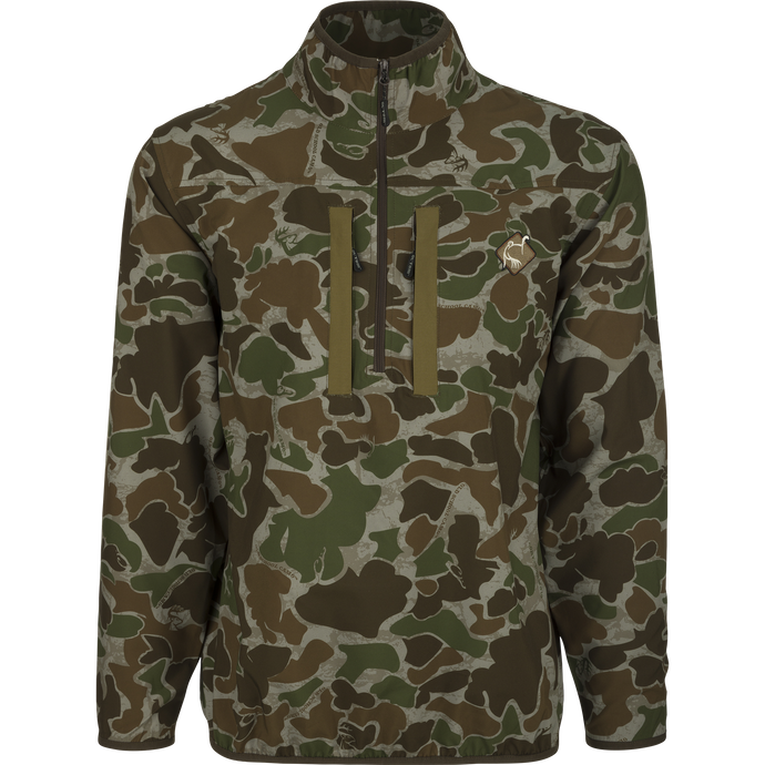 A camouflage Tech Quarter Zip with Spine Pad from Drake Waterfowl. Features include Magnattach™ pockets, range finder lanyard, and removable spine pad for hunting comfort.