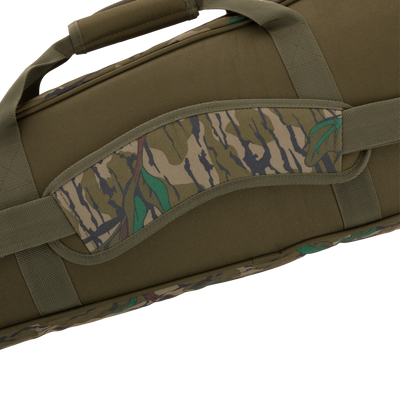 Turkey Gun with Optics Case featuring camouflage fabric, close-up of rugged HD2™ material, visible pockets, fabric strap, and padded shoulder sling for hunting gear storage.