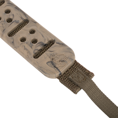 Turkey Tote's close-up featuring robust vulcanized rubber strap, durable polypropylene webbing, and solid metal slip ring for secure bird transport.