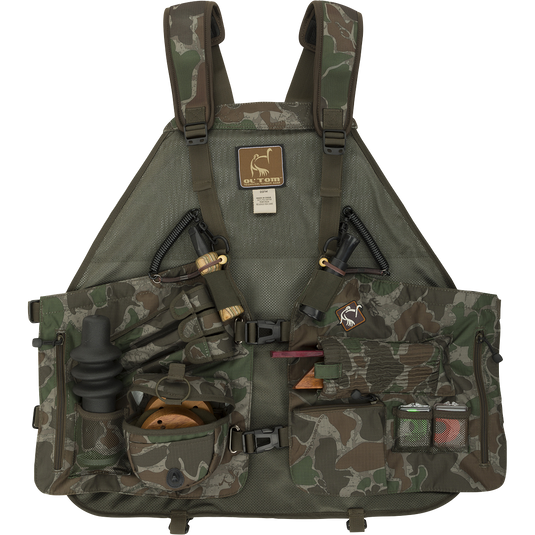 Time & Motion™ Easy-Rider Turkey Vest with various tools and accessories, including a quick-draw slate call pouch, Magnattach™ striker sleeves, and storage pockets. Lightweight and comfortable for all-day hunting.