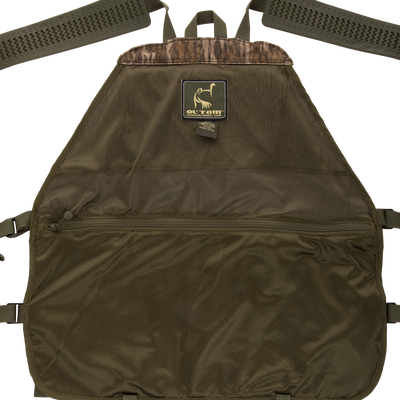 Time & Motion™ Gunslinger Turkey Vest, featuring adjustable straps and organized pockets for hunting essentials, with a visible logo close-up in the image.