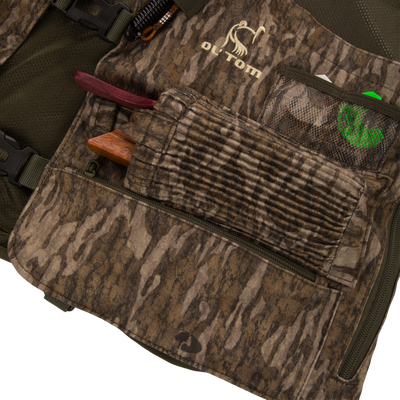 Time & Motion™ Gunslinger Turkey Vest, featuring well-distributed Gunslinger straps, multiple organized pockets, and a removable seat cushion, ideal for efficient hunting gear storage.