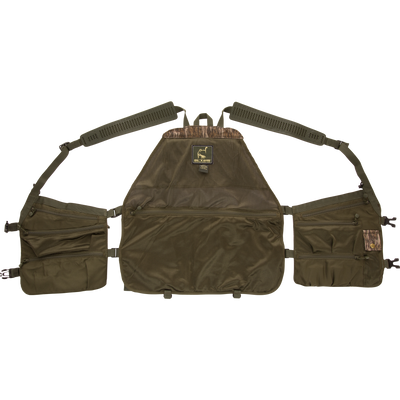 Time & Motion™ Gunslinger Turkey Vest close-up, showcasing organized call pockets and adjustable rubber straps, designed for efficient gear access during hunting.
