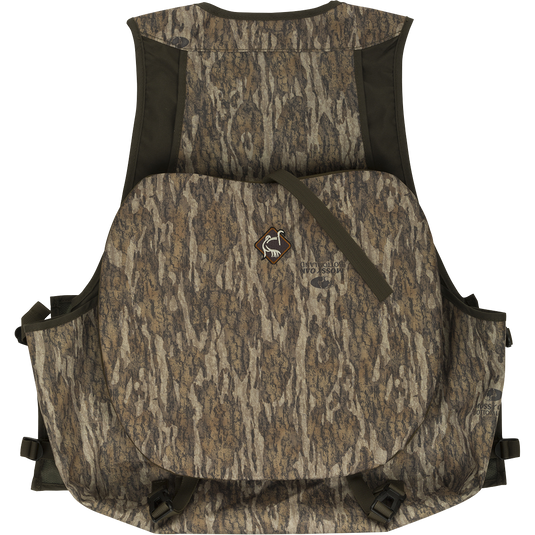 Time & Motion Youth Easy-Rider Turkey Vest - Old School Green: Camouflage vest with logo, detachable padded seat cushion, zippered pockets, and quick-draw shell loops for youth sportsmen.