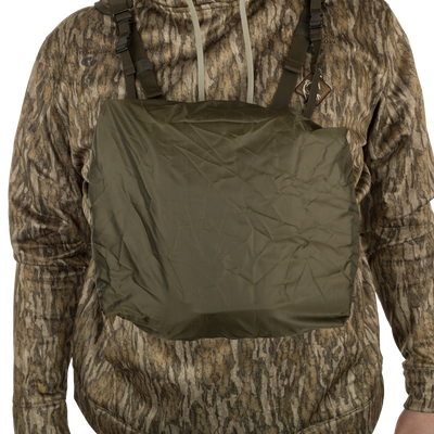 Turkey Chest Pack displayed on a person, showcasing its rain cover.