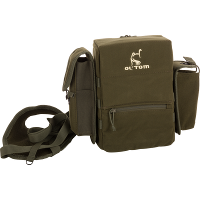 Turkey Chest Pack with logo, featuring a removable bino harness, multiple pockets, and a stowable rain fly, ideal for hunting trips.