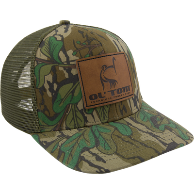 LOST Hat X Ol Tom Slate Cap featuring a camo pattern, olive mesh, and leather patch, ideal for hunting with adjustable snapback for a custom fit.