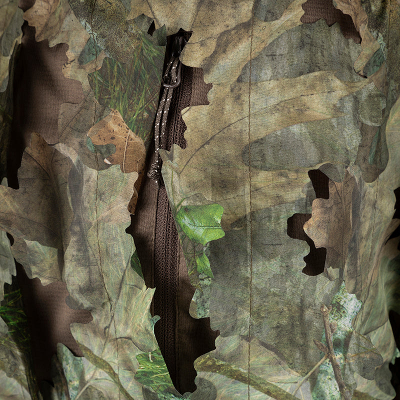 3D Leafy Pant: Close-up of a lightweight, breathable jacket with a leafy pattern cutout for turkey hunting. Zippered pass-through pockets for easy access.