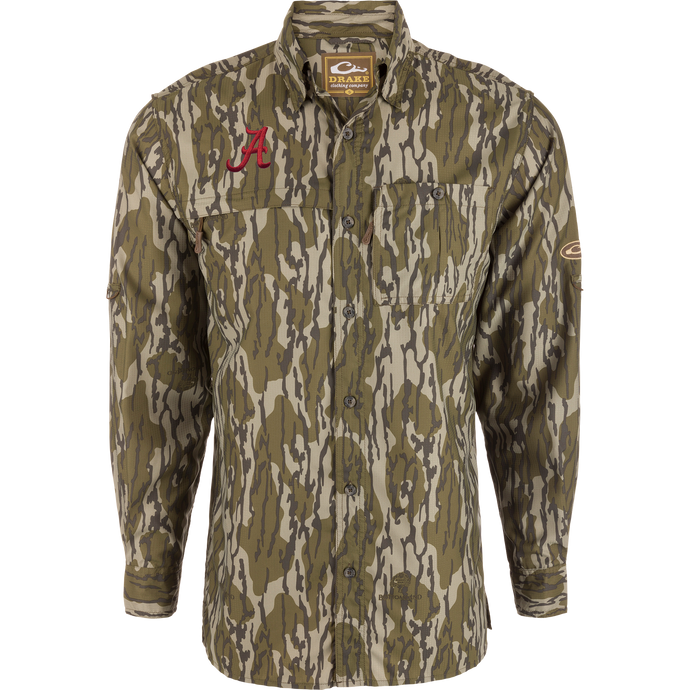Alabama 8-Shot Long Sleeve Shirt with woodland camo pattern, features Alabama logo, dual chest pockets, and vented back. Ideal for hunting with UPF 30 protection.