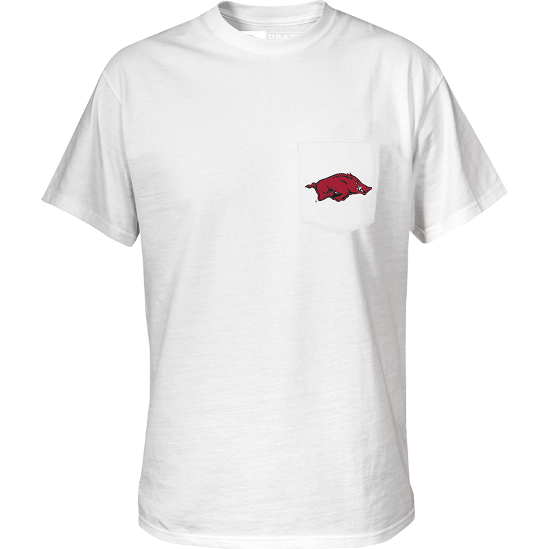 Arkansas Saturdays T-Shirt: White shirt with red pig logo on chest pocket and stylized text on back. Cotton/poly blend tee for football fans.