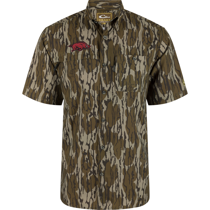 Arkansas 8-Shot Short Sleeve Shirt in camouflage, featuring chest pockets, razorback hog patch, and vented cape back, designed for moisture wicking and sun protection.