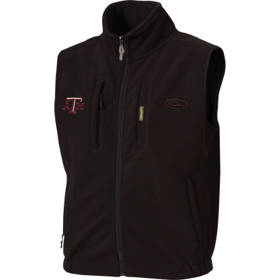 Texas A&M Windproof Layering Vest, a black sleeveless fleece with maroon logo, features windproof, water-resistant material, zip-up design, and practical pockets for outdoor comfort.
