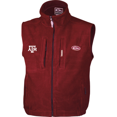 Texas A&M Windproof Layering Vest featuring embroidered logos, stand-up collar, chest and side zip pockets, designed for warmth without bulk.