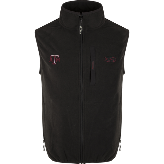Texas A&M Camp Fleece Vest with logo embroidery on right chest. Windproof, water resistant, ultra-warm fleece. Stand-up collar, Magnattach™ pocket, hand warmer pockets.