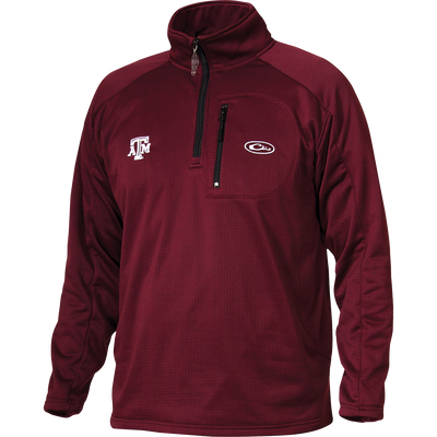 Texas A&M Breathelite 1/4 Zip: A red jacket with logo embroidery on the right chest. Made of 100% polyester with 4-way stretch and square check fleece backing. Features a vertical front chest zippered pocket. Ideal for active outdoorsmen in cool weather.