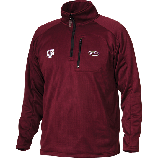 Texas A&M Breathelite 1/4 Zip: A red jacket with logo embroidery on the right chest. Made of 100% polyester with 4-way stretch and square check fleece backing. Features a vertical front chest zippered pocket. Ideal for active outdoorsmen in cool weather.