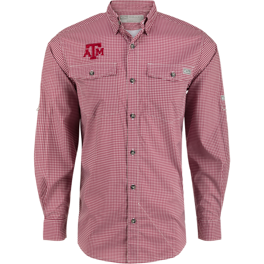 Texas A&M Frat Gingham Long Sleeve Shirt, a lightweight performance shirt with hidden collar, chest pockets, and adjustable sleeves.